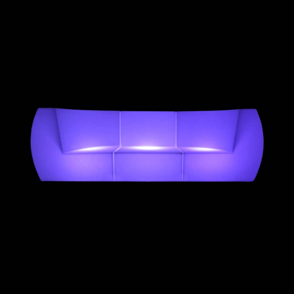 3-piece modular LED lounge sofa set illuminated in solid UV color on a black background